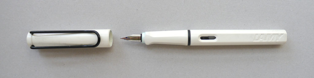 White Lamy Safari fountain pen fitted with a 1.1 italic nib
